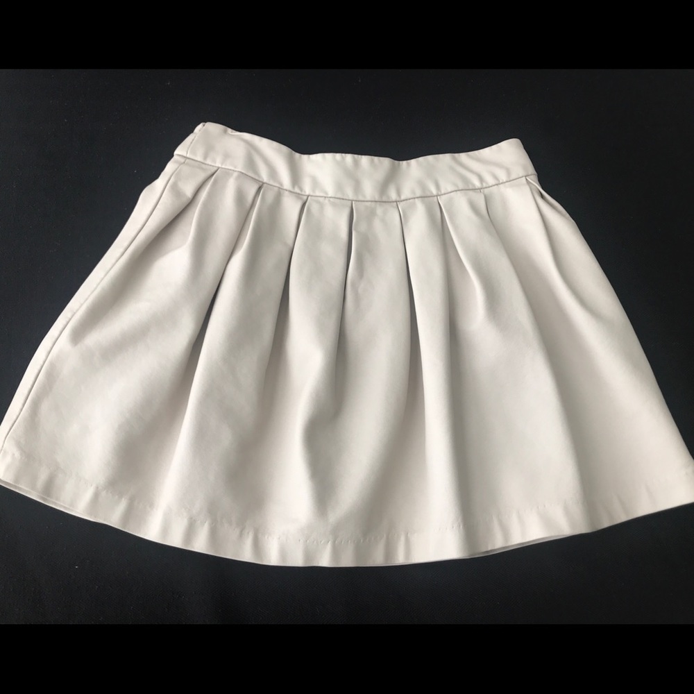 Off white pleated mini skirt